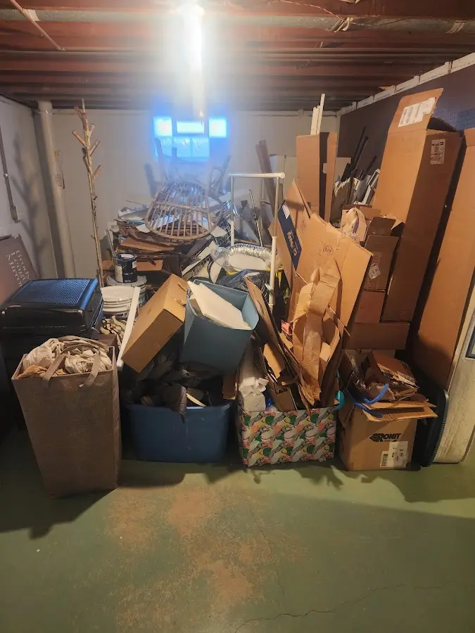 Roll-off dumpster container at job site for 2 Yard Dumpster Rental in Bloomingdale